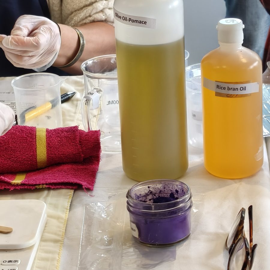 Bottles of oils and colours on the workshop table
